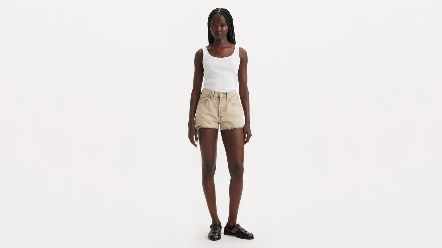 Full view beige shorts with white tank top