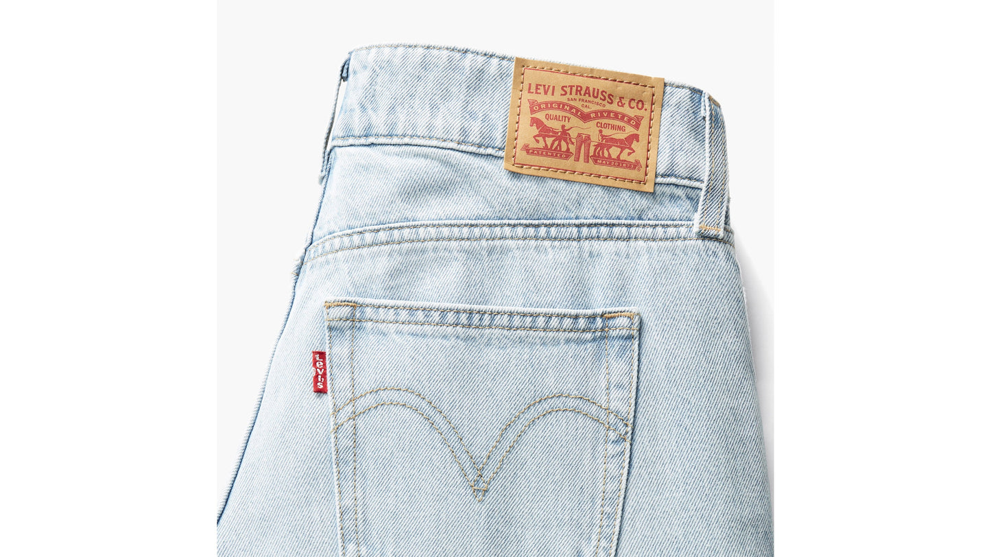 Detailed shot, Levi's light washed jeans, leather patch