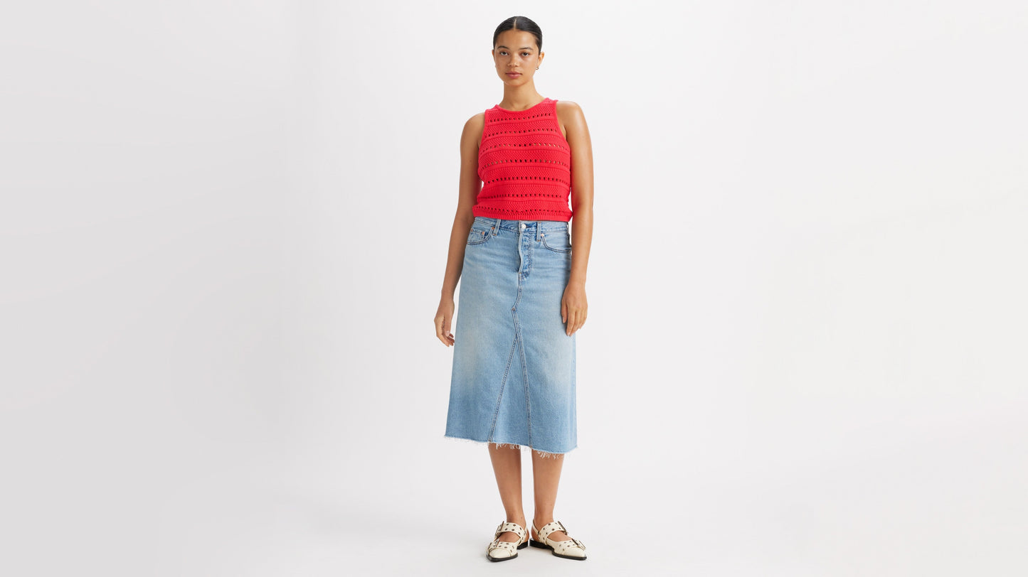 Woman in Levi's high-rise a-Line skirt and red top