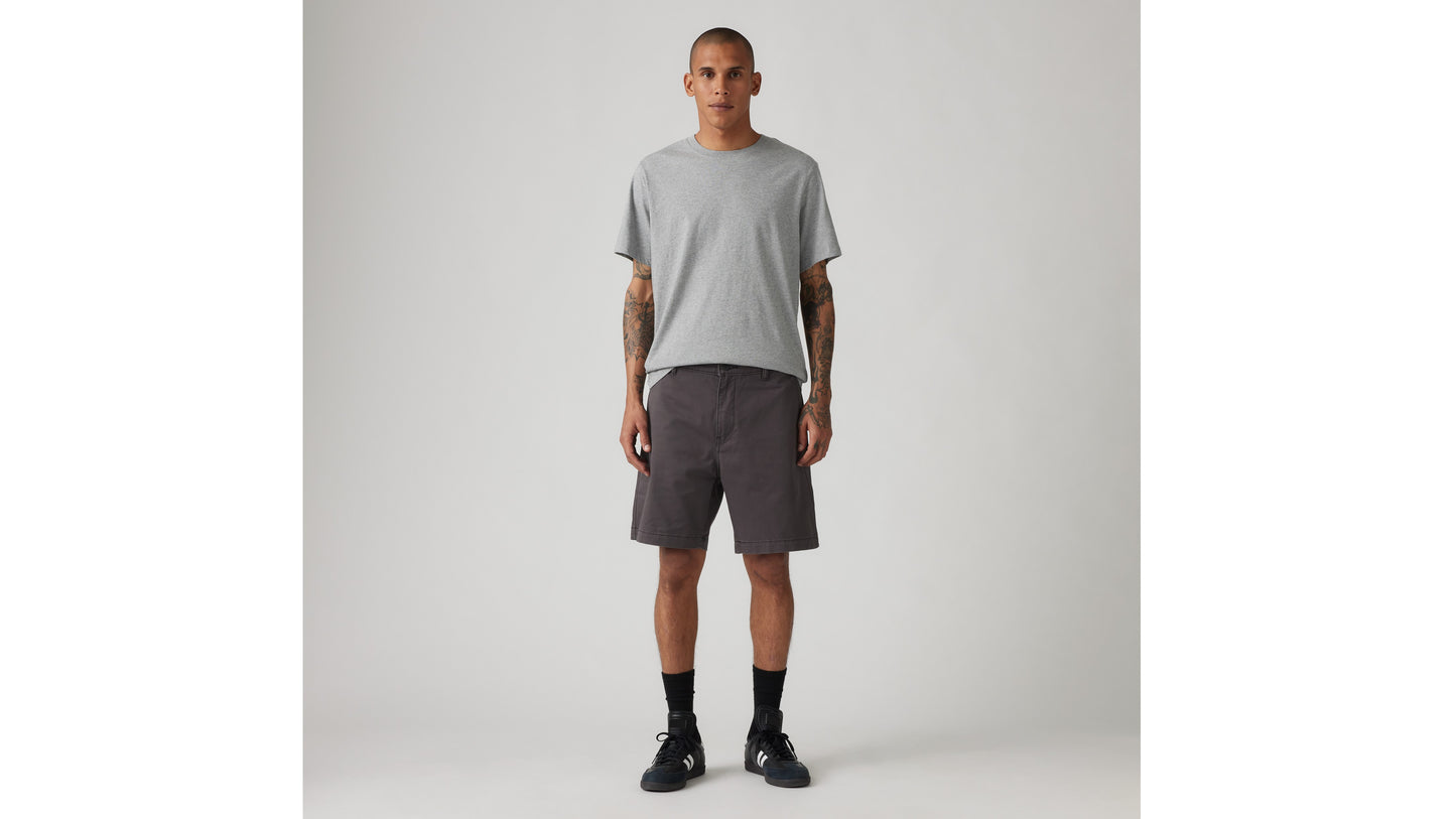 Levi's dark grey shorts paired with a grey tee