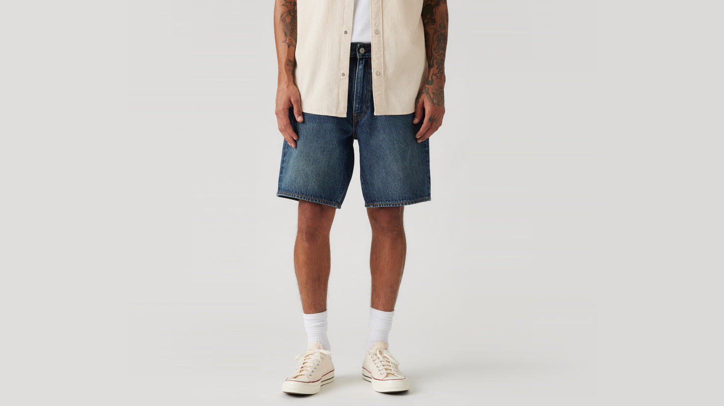 Man wears Levi's loose fit denim shorts