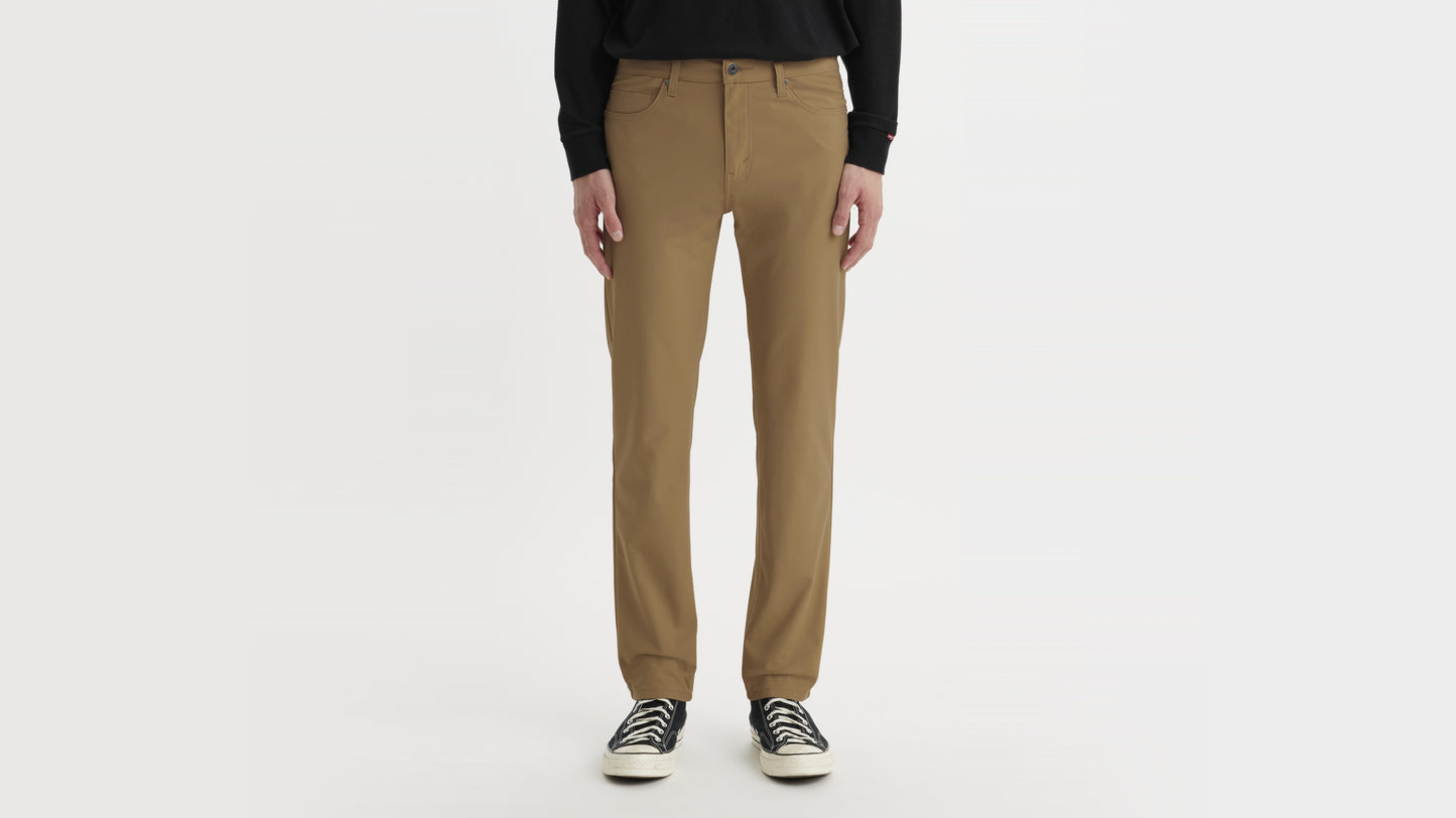 Levi's brown straight-leg pants paired with sneakers