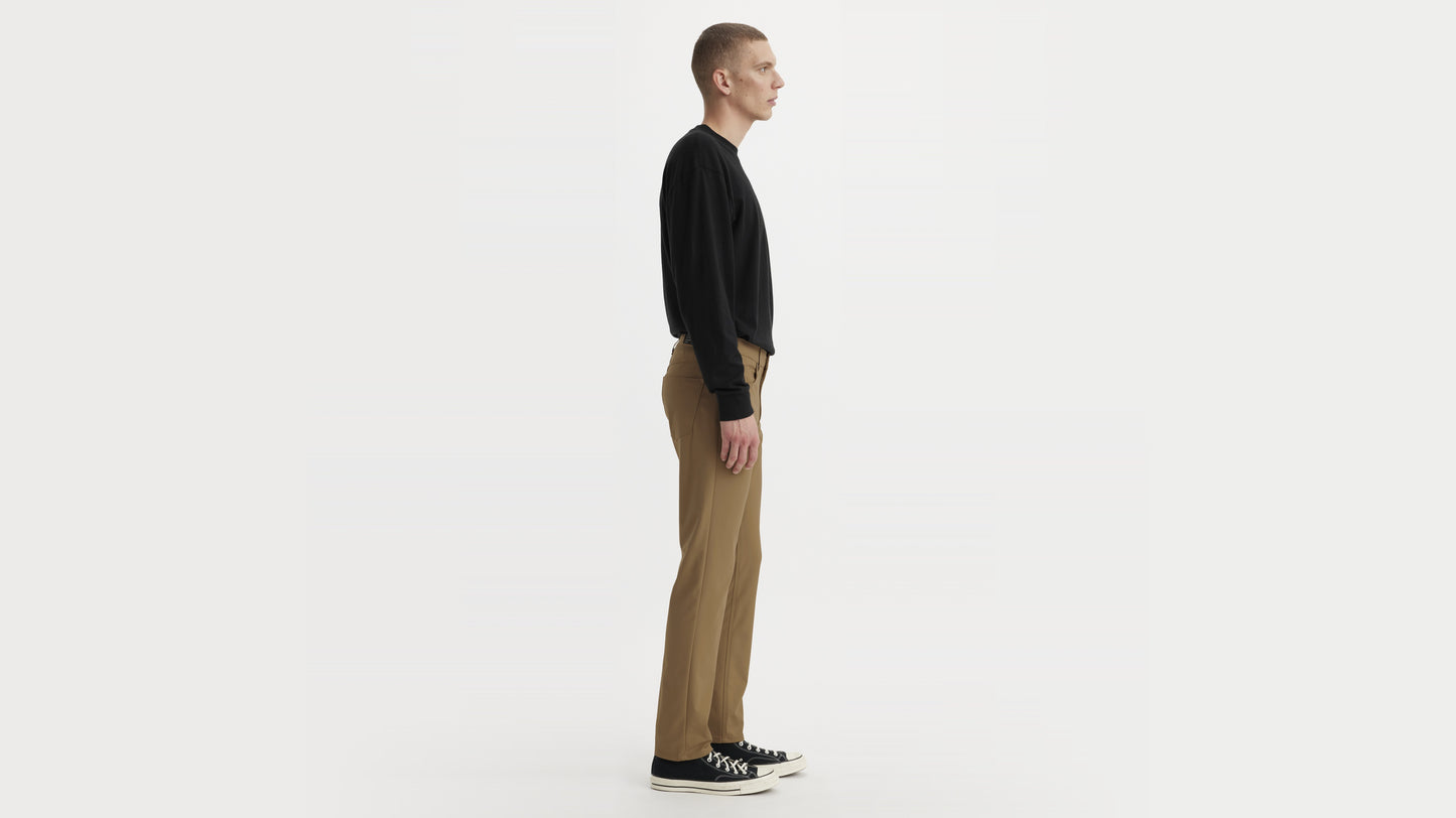 Man in Levi's brown straight-leg pants