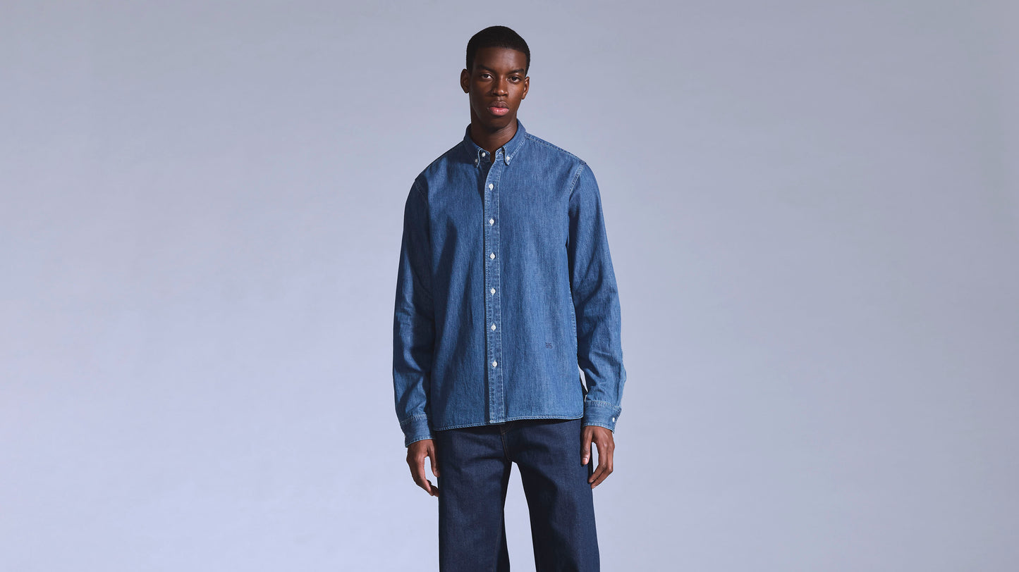 Model wearing Levi's dark blue long-sleeves denim