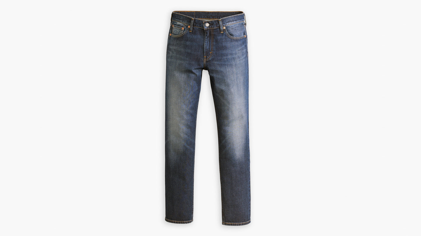 Flat lay front view of mid-wash Levi’s 511 slim jeans with faded detailing
