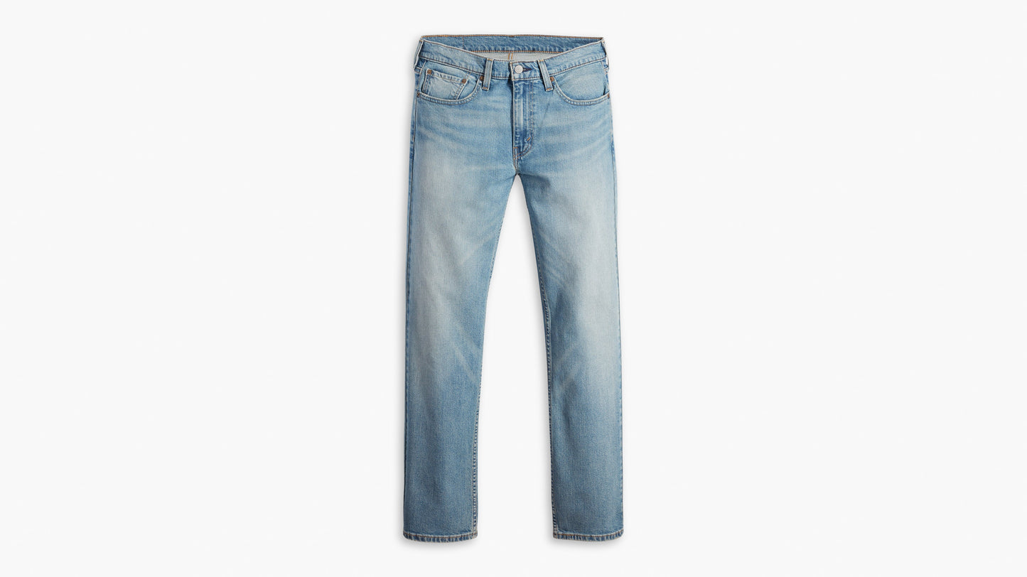 Front view of light wash Levi’s 514 jeans laid flat with classic five-pocket styling