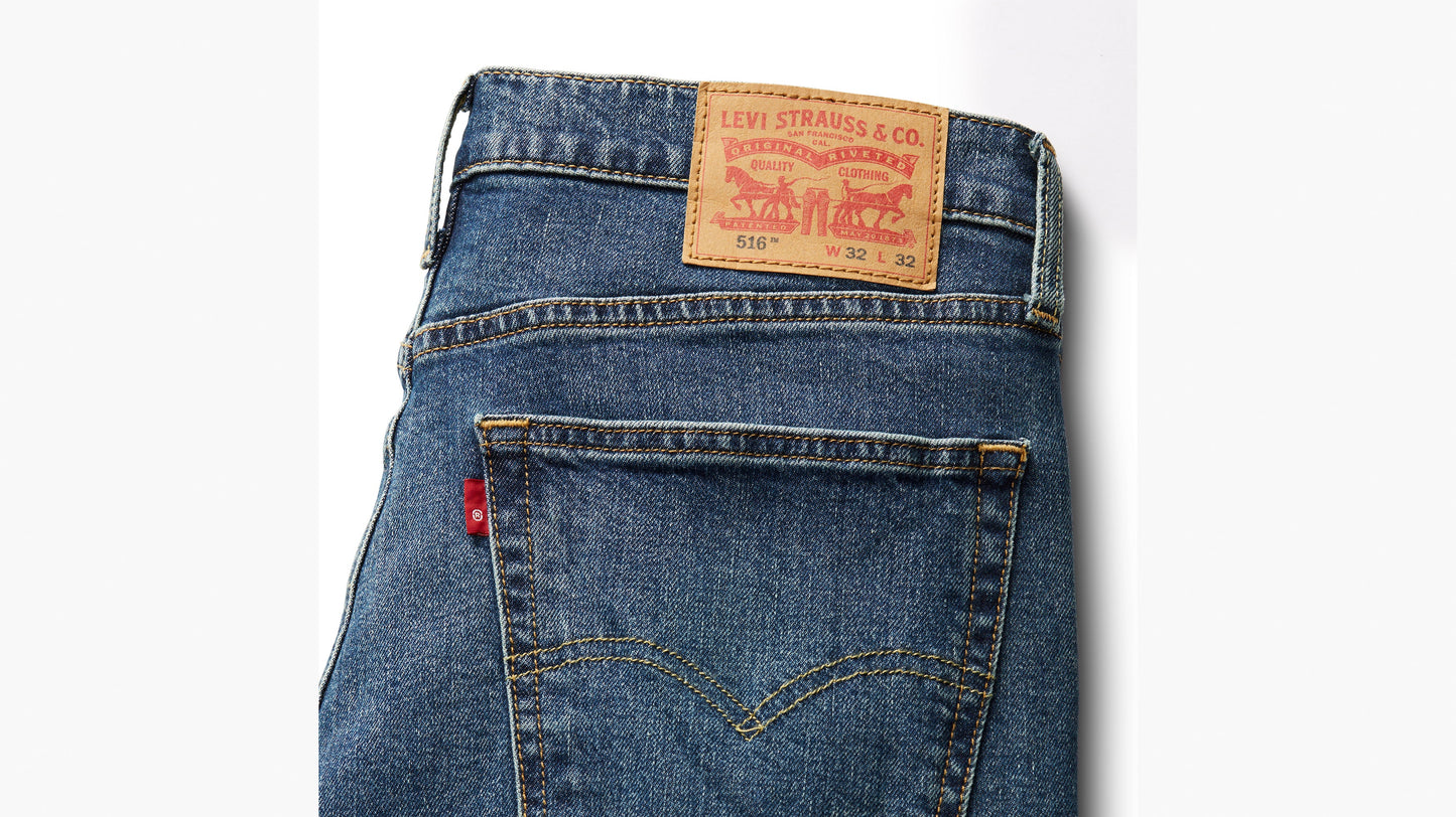 Detailed shot of Levi’s 516 jeans with branded leather patch & red tab