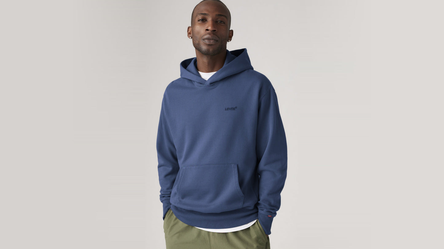 Model in navy Levi's hoodie with kangaroo pocket & logo