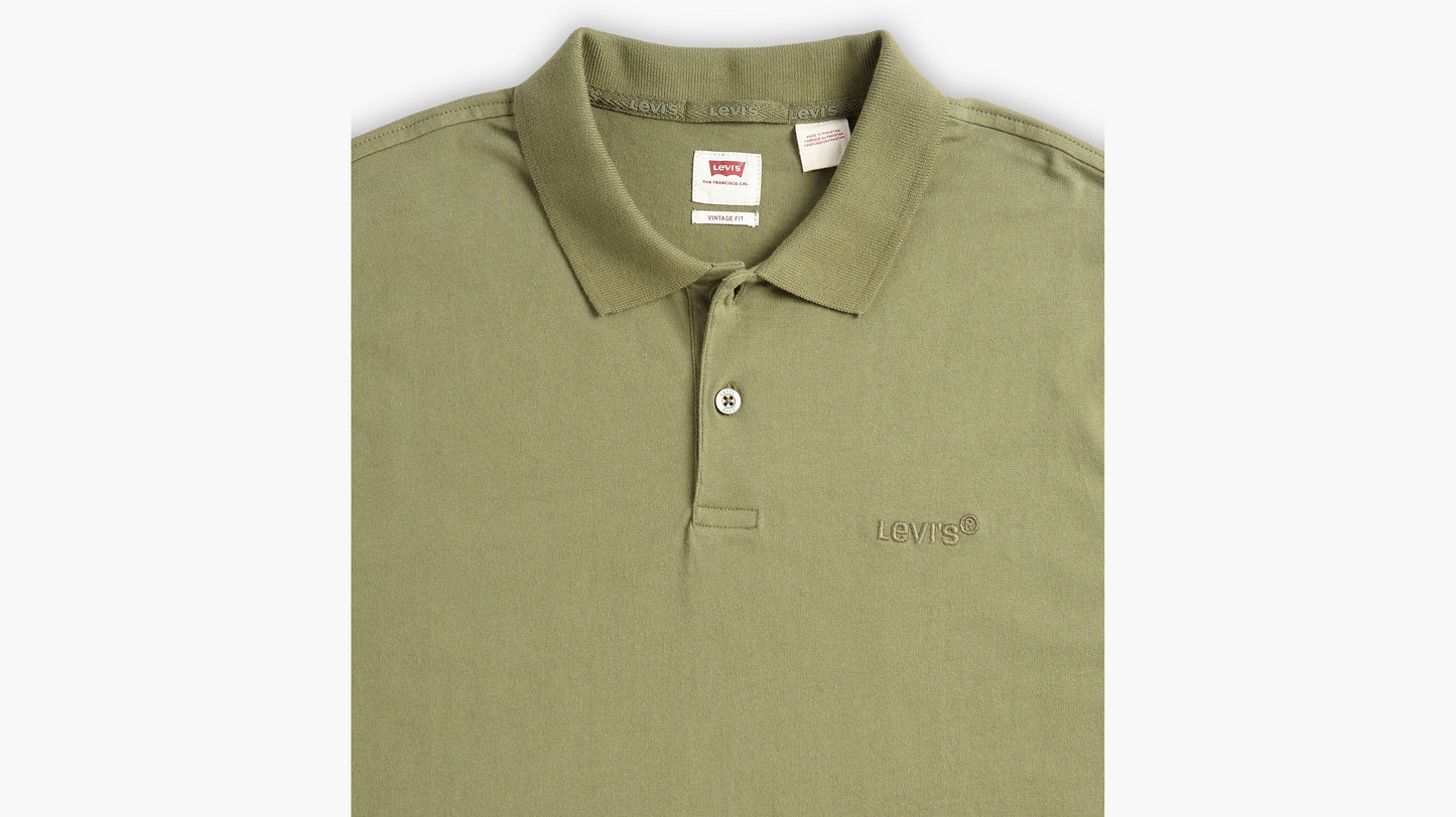 Close-up of olive Levi's polo collar and buttons
