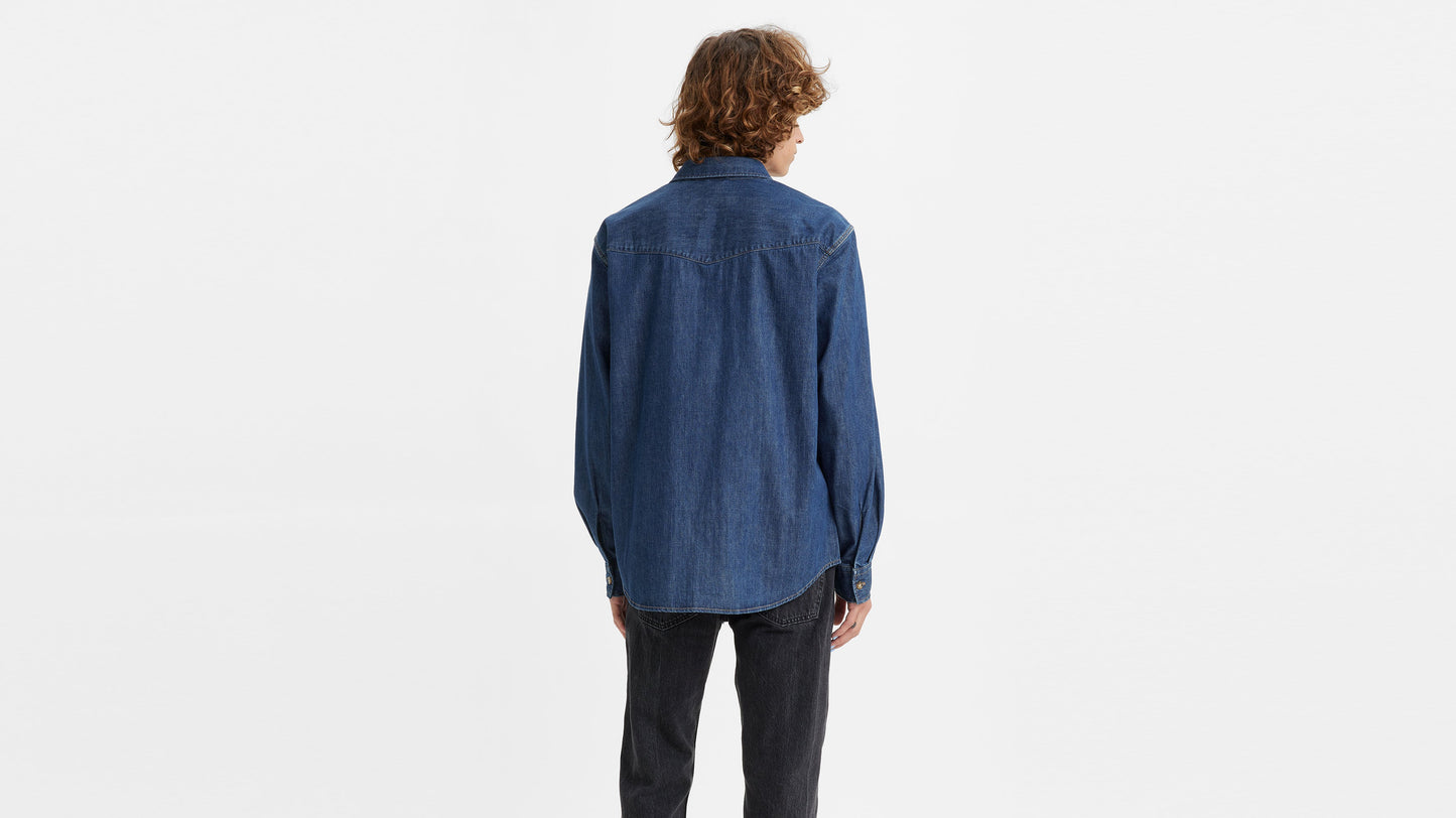 Man in Levi's Relaxed Fit Western Shirt and black jeans, back view