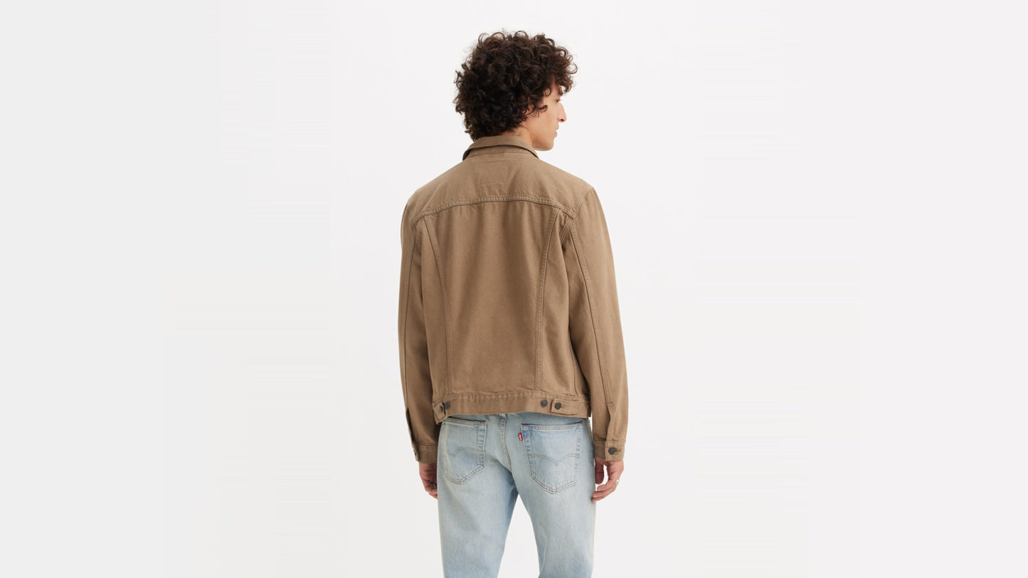 Rear angle of Levi’s khaki denim trucker jacket on male model