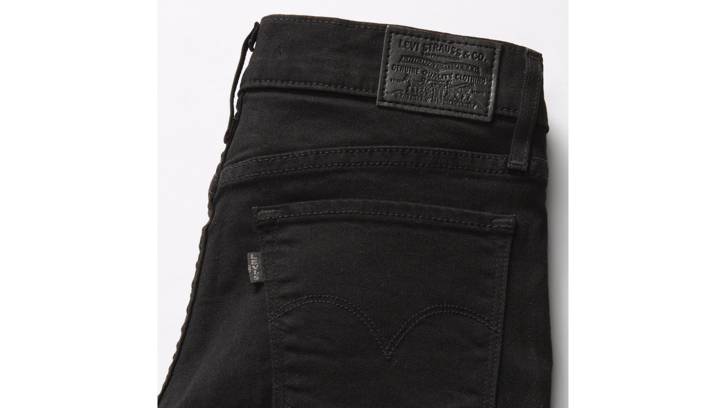 Close-up of Levi’s 312 Shaping Slim jeans in black with black patch