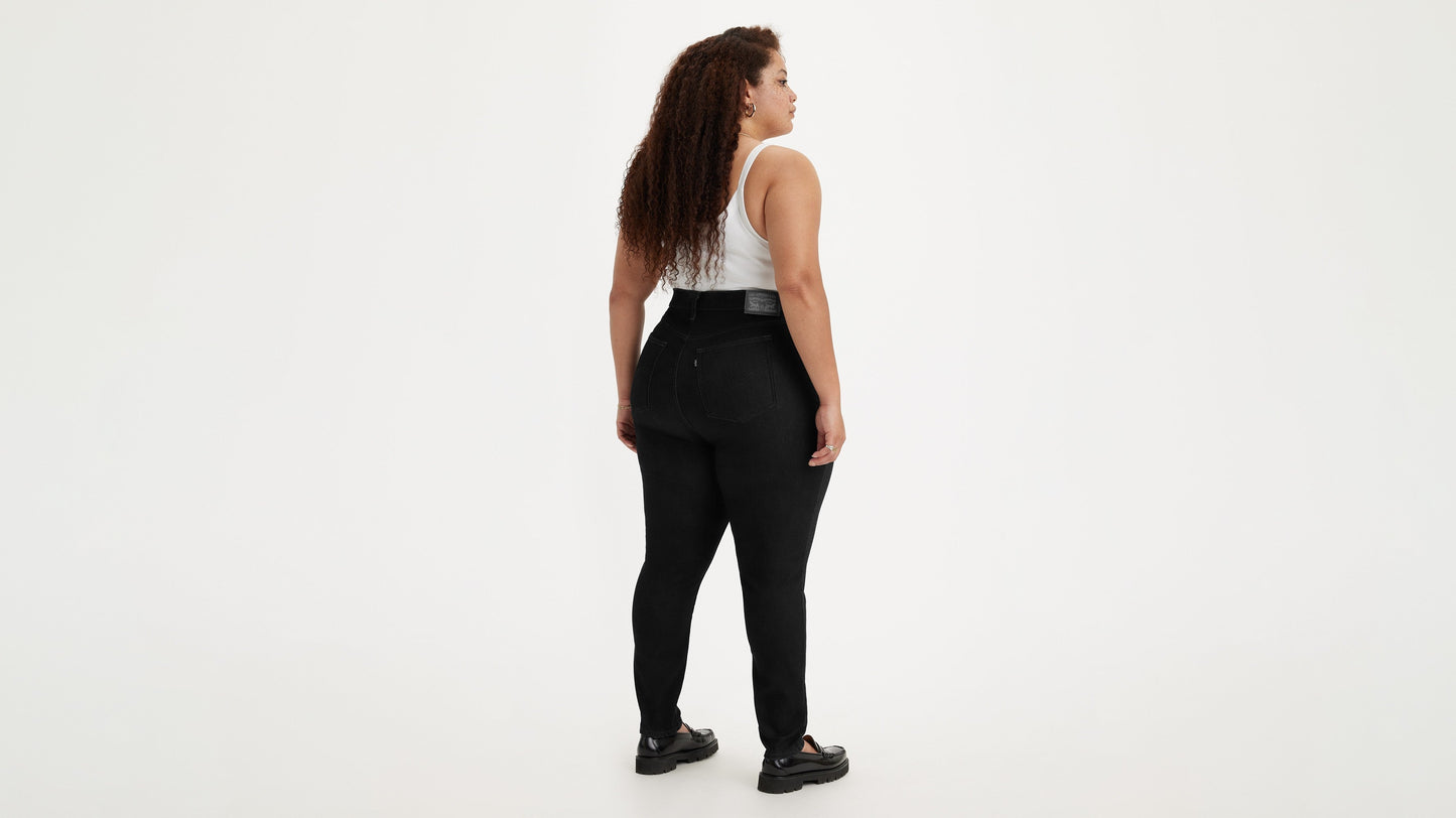 Back view of woman in Levi's high rise plus size skinny jeans