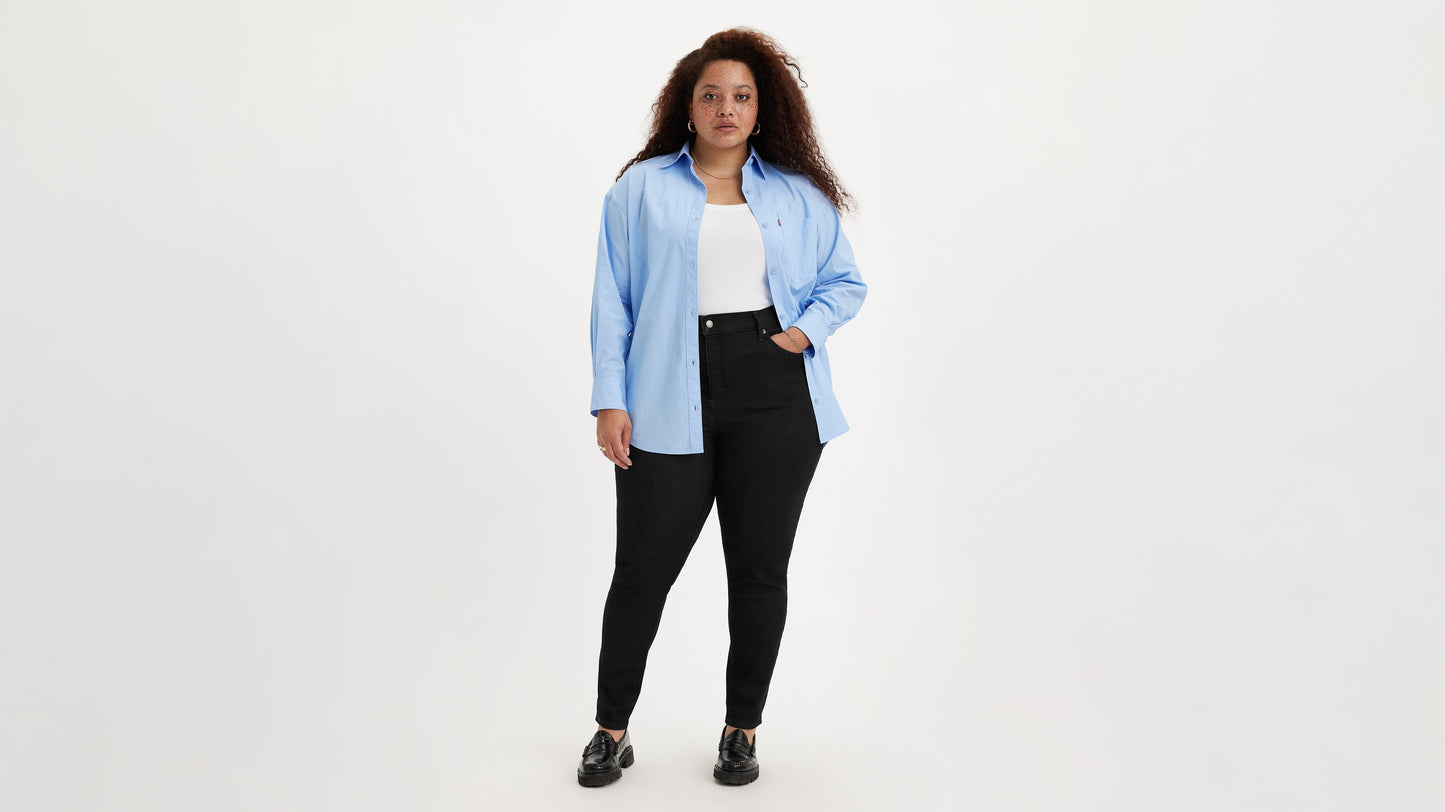 Woman in Levi's womens high rise plus size skinny jeans