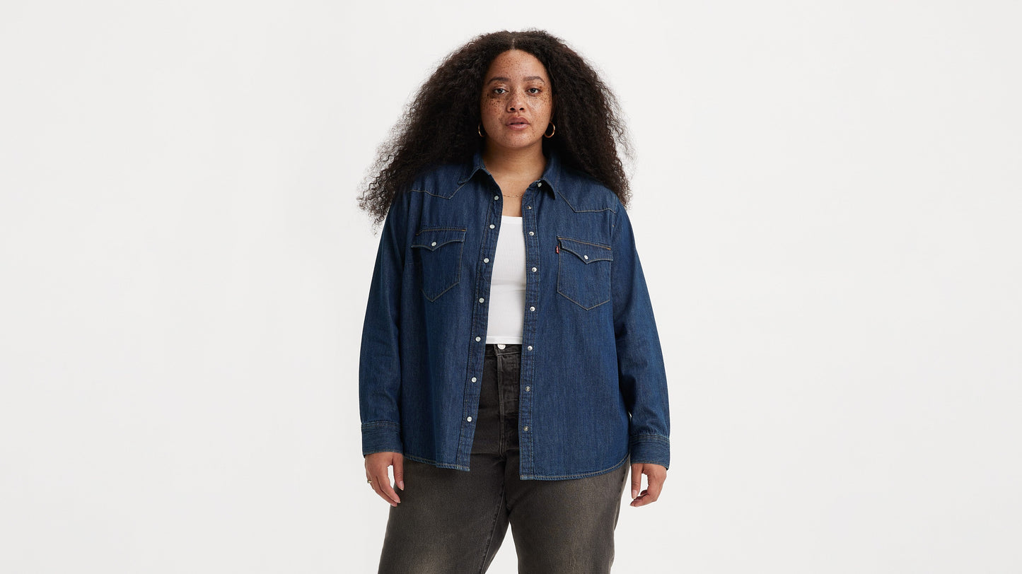 Plus size woman wearing blue Levi's western shirt