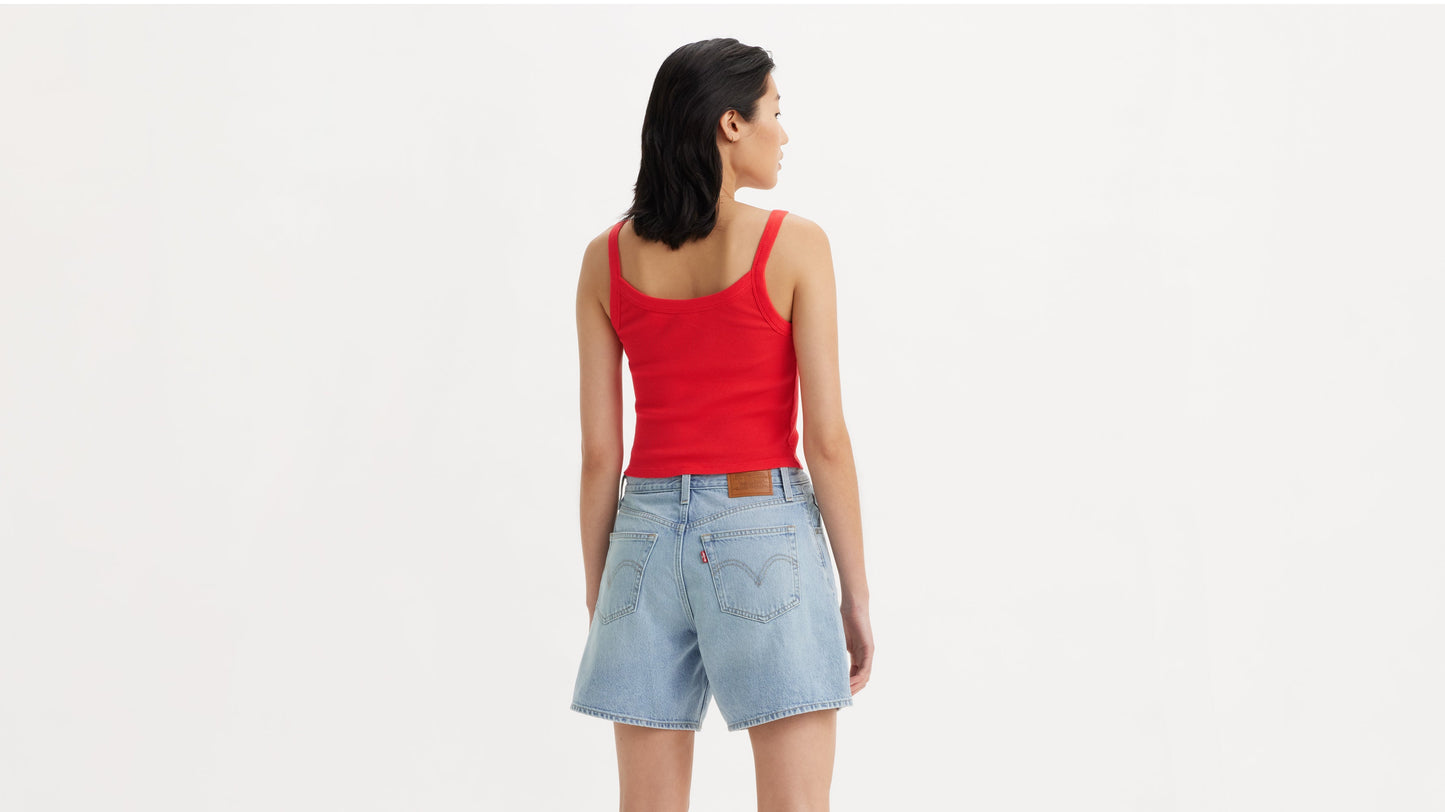 Model showing back of red Levi's tank and denim shorts