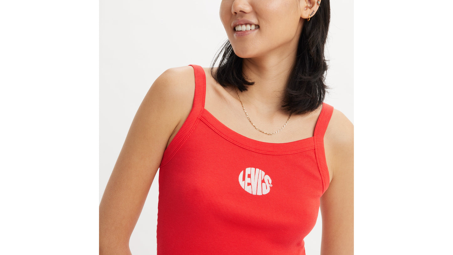 Close-up of woman smiling in red Levi's tank top
