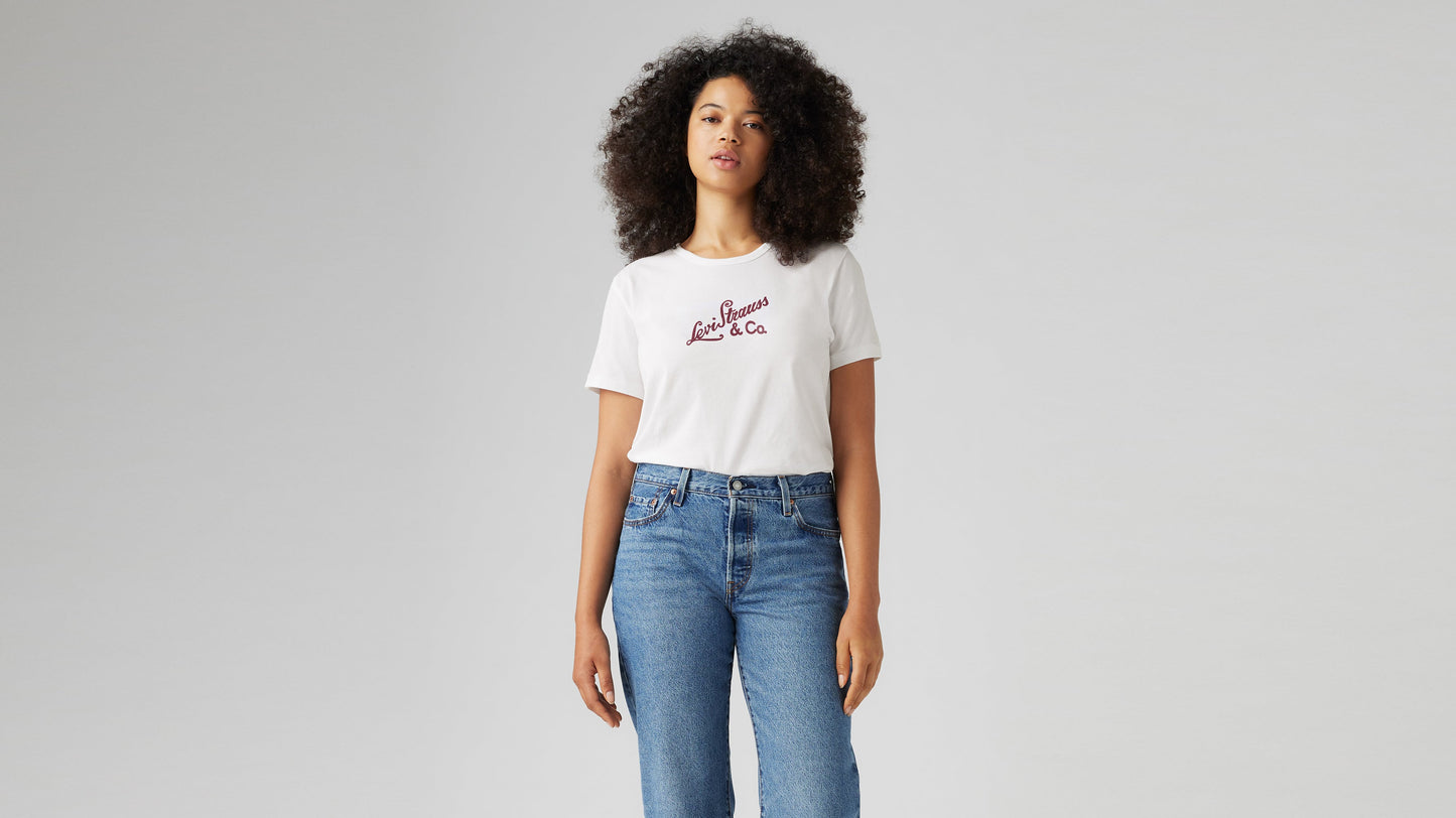 Woman wearing Levi's logo t-shirt and relaxed blue jeans