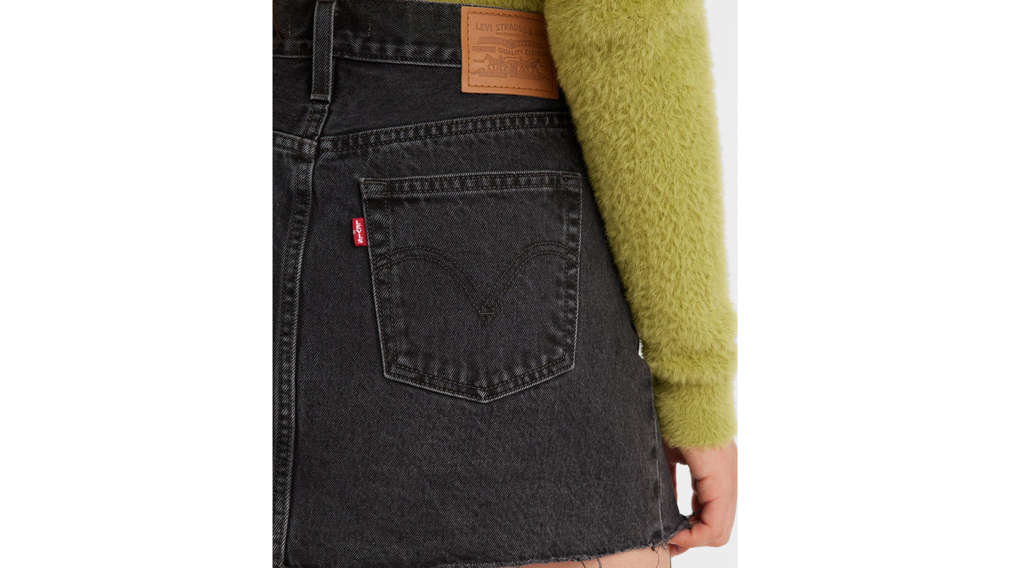 Close-up of Levi's leather patch and back pocket with red tab on black icon skirt