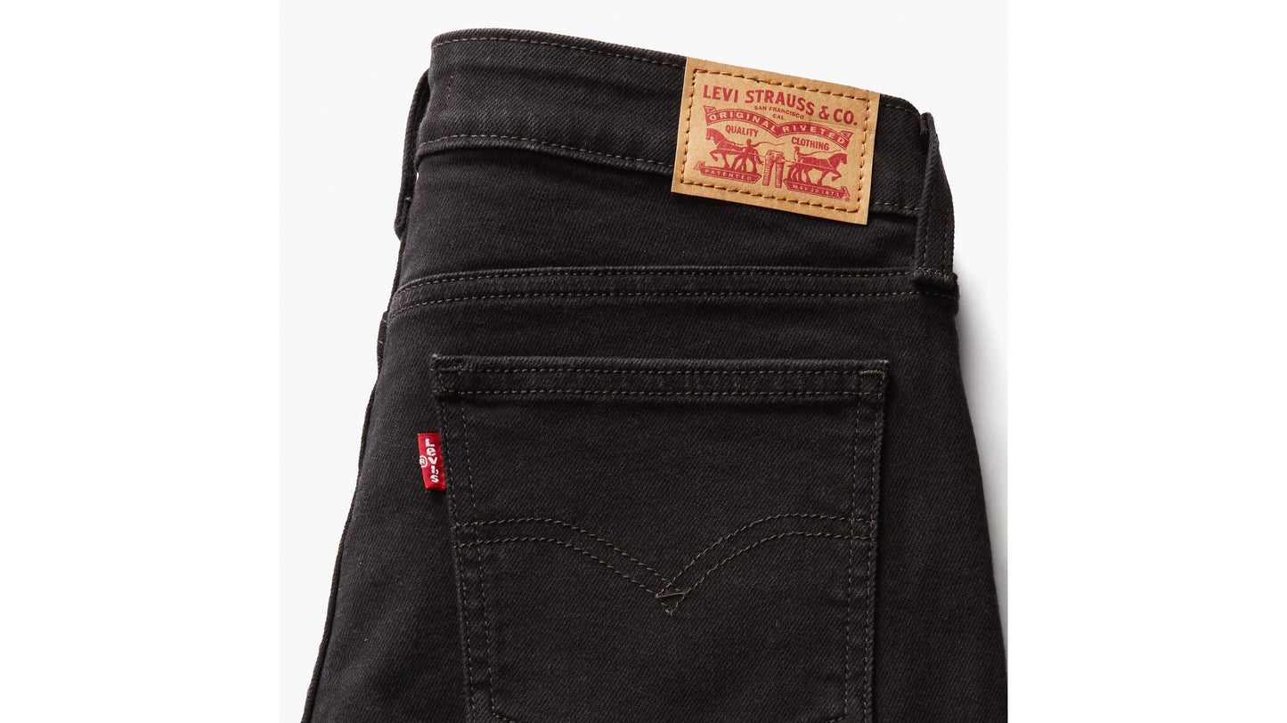 Close-up of Levi's Superlow Bootcut Jeans back pocket with red tab and logo patch