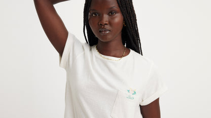 Woman in Levi's white graphic pocket shirt, close-up