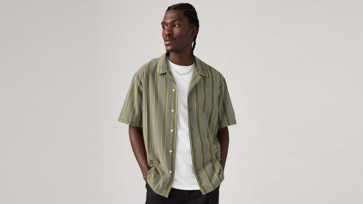 Man in green Levi's men's knit camp shirt