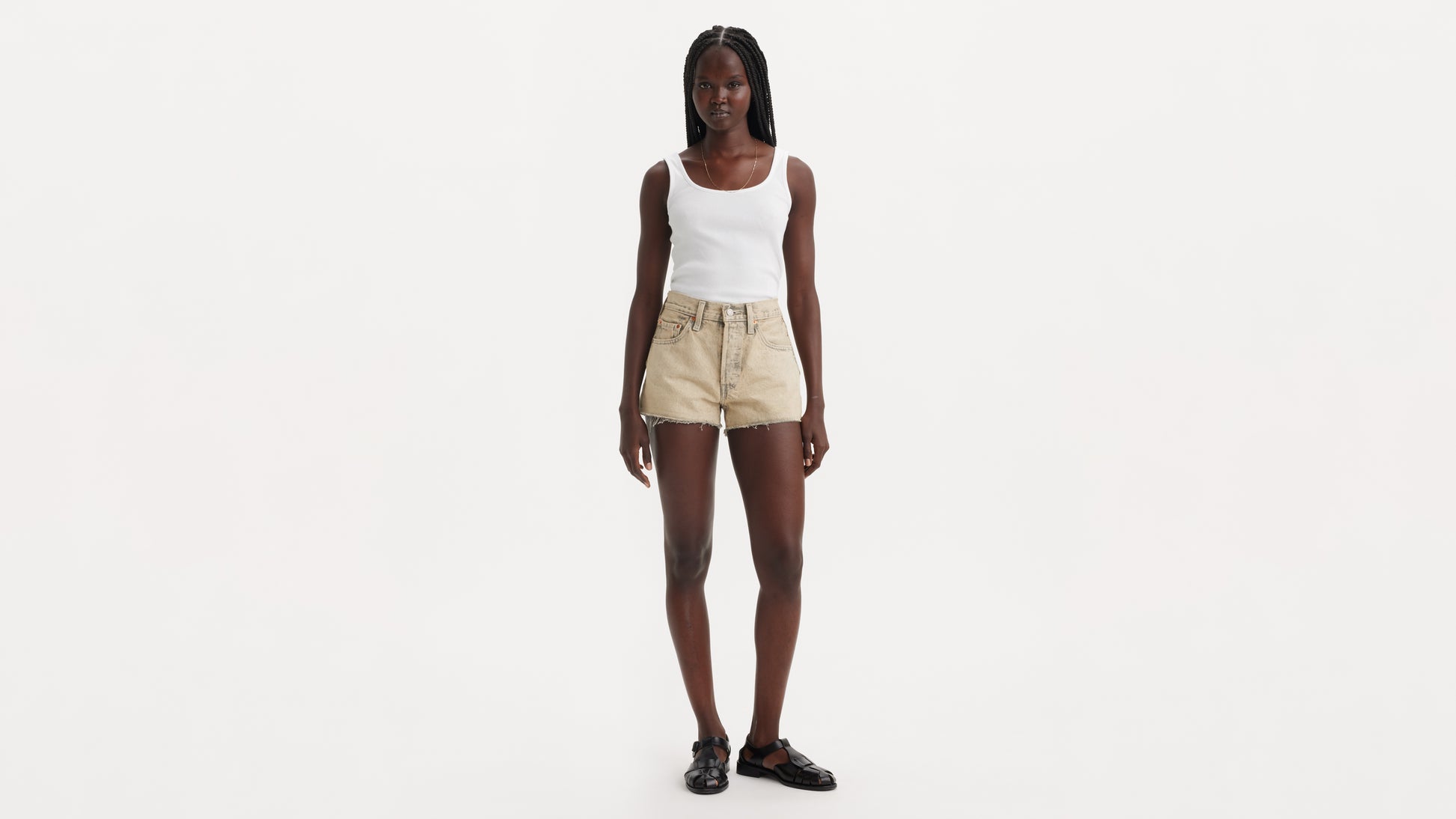 Full view beige shorts with white tank top