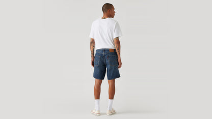 Back view of man in Levi's denim shorts