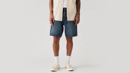 Man wears Levi's loose fit denim shorts