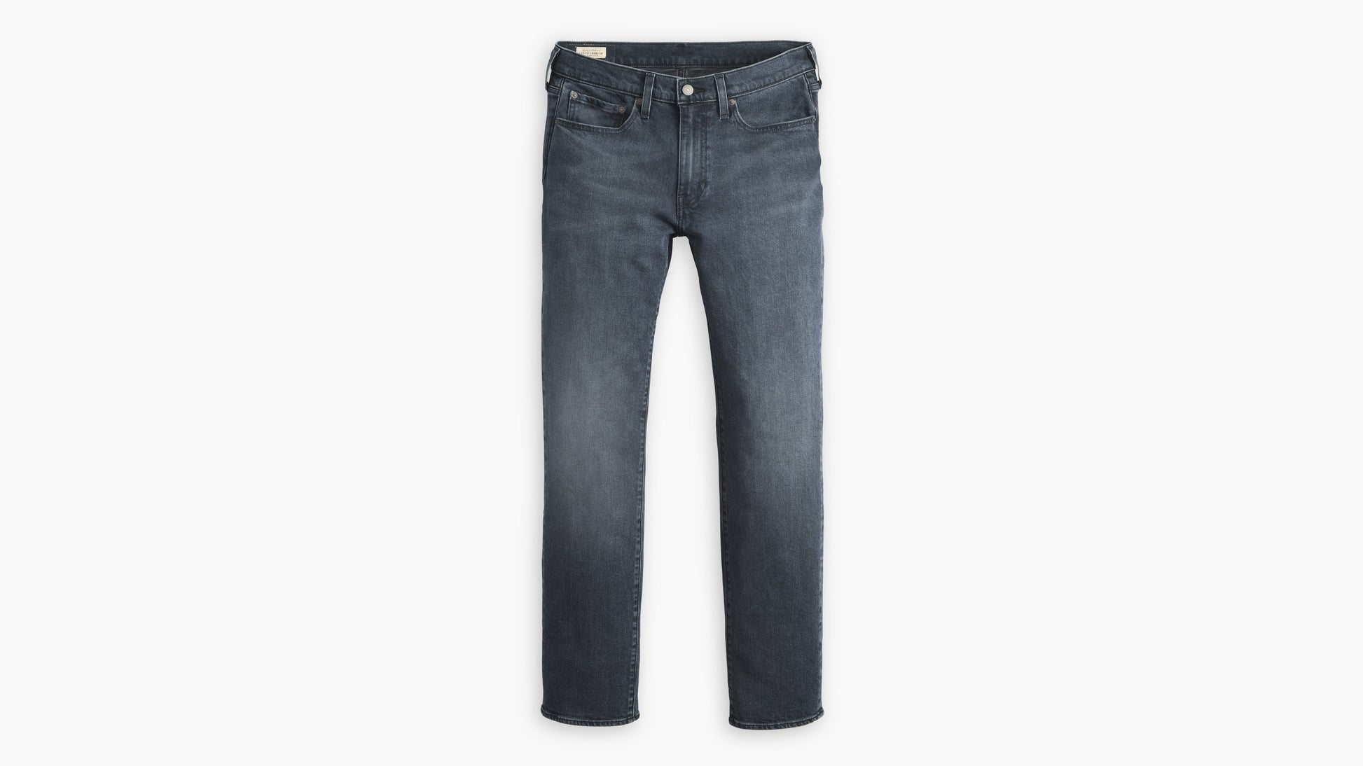 Flat lay of classic dark indigo Levi’s514 jeans with a straight-leg cut and clean fading