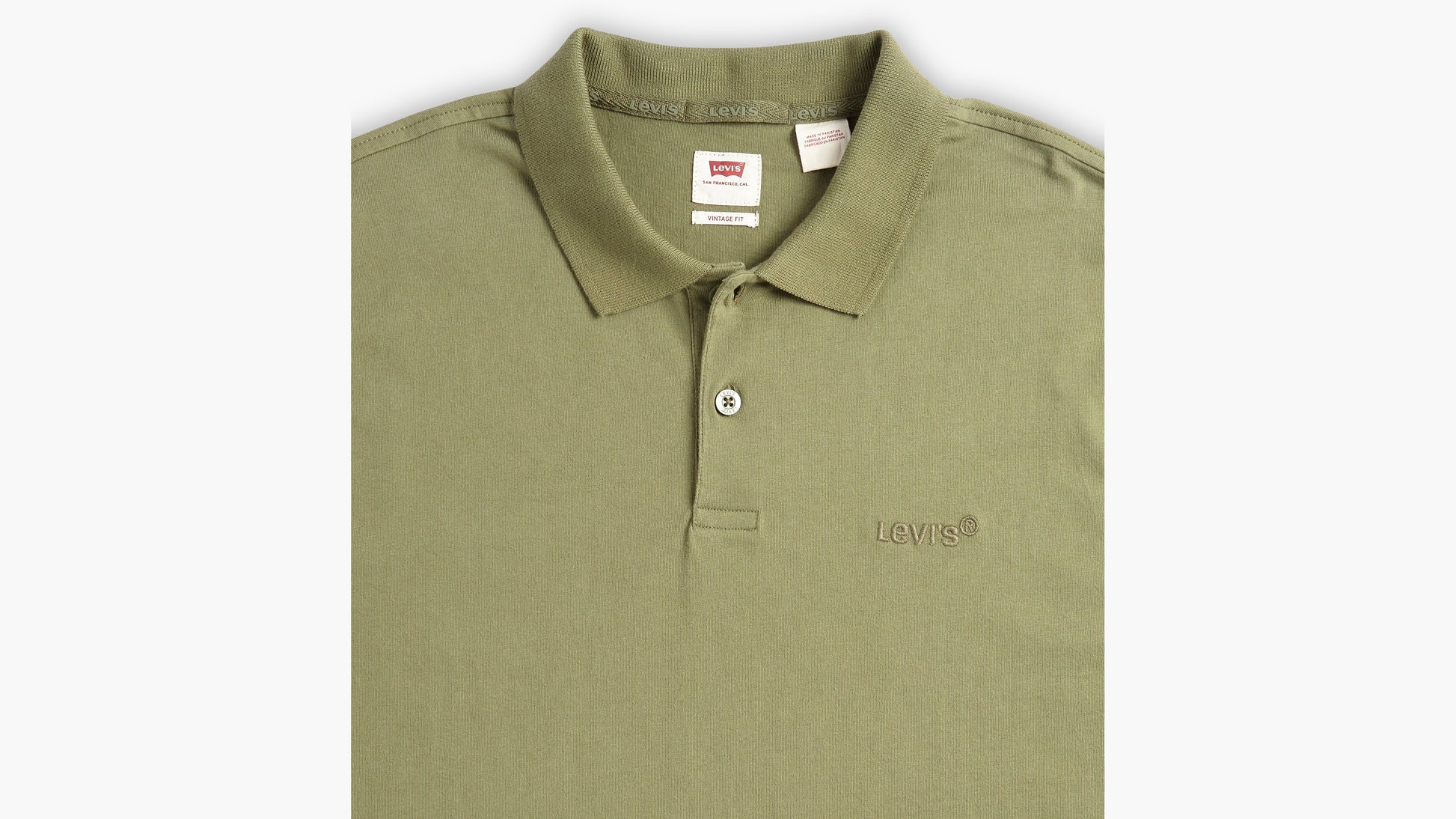 Close-up of olive Levi's polo collar and buttons