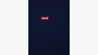 Close-up of Levi’s red logo on navy blue fabric