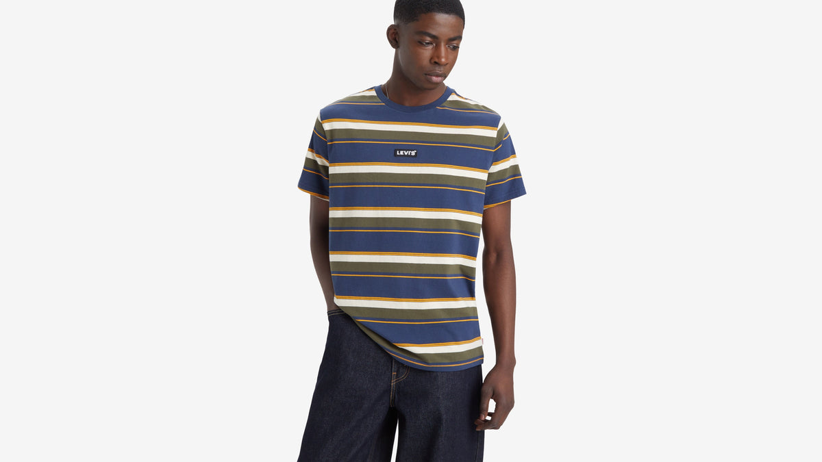 Levi’s striped tee with blue, green, white, and gold bands