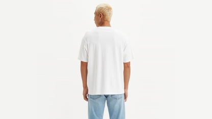 Man in Levi's White Vintage Batwing Graphic T-Shirt with light jeans, back view