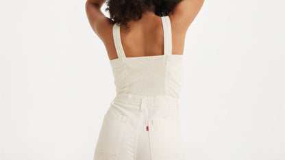 Back detail of white Levi’s jumpsuit with smocked panel