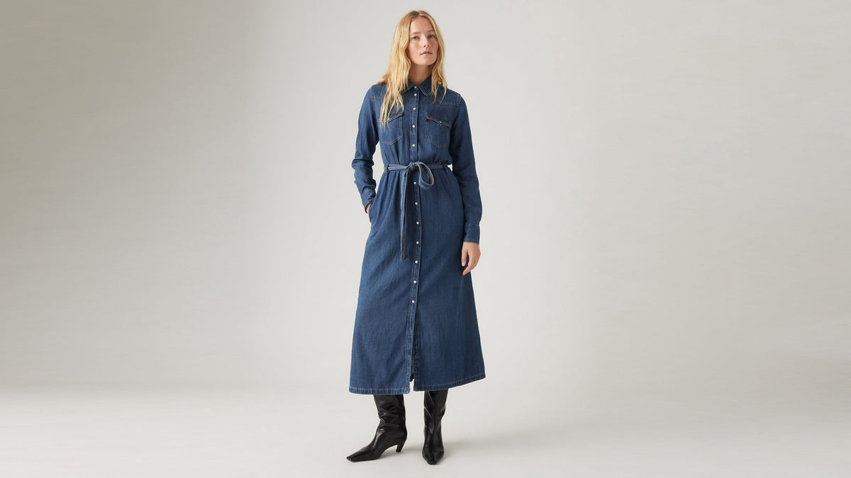 Model wearing button-down dark denim maxi dress