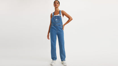 Woman in Levi’s vintage denim overalls and white tank